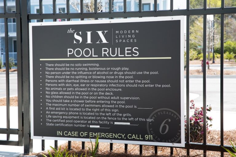 The Six pool rules black panel on railings
