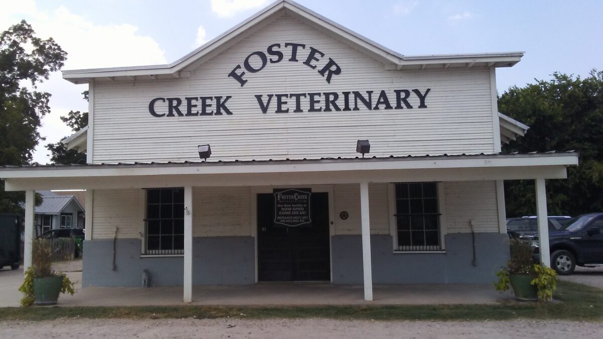 FOSTER CREEK VETERINARY cut letters on a gable
