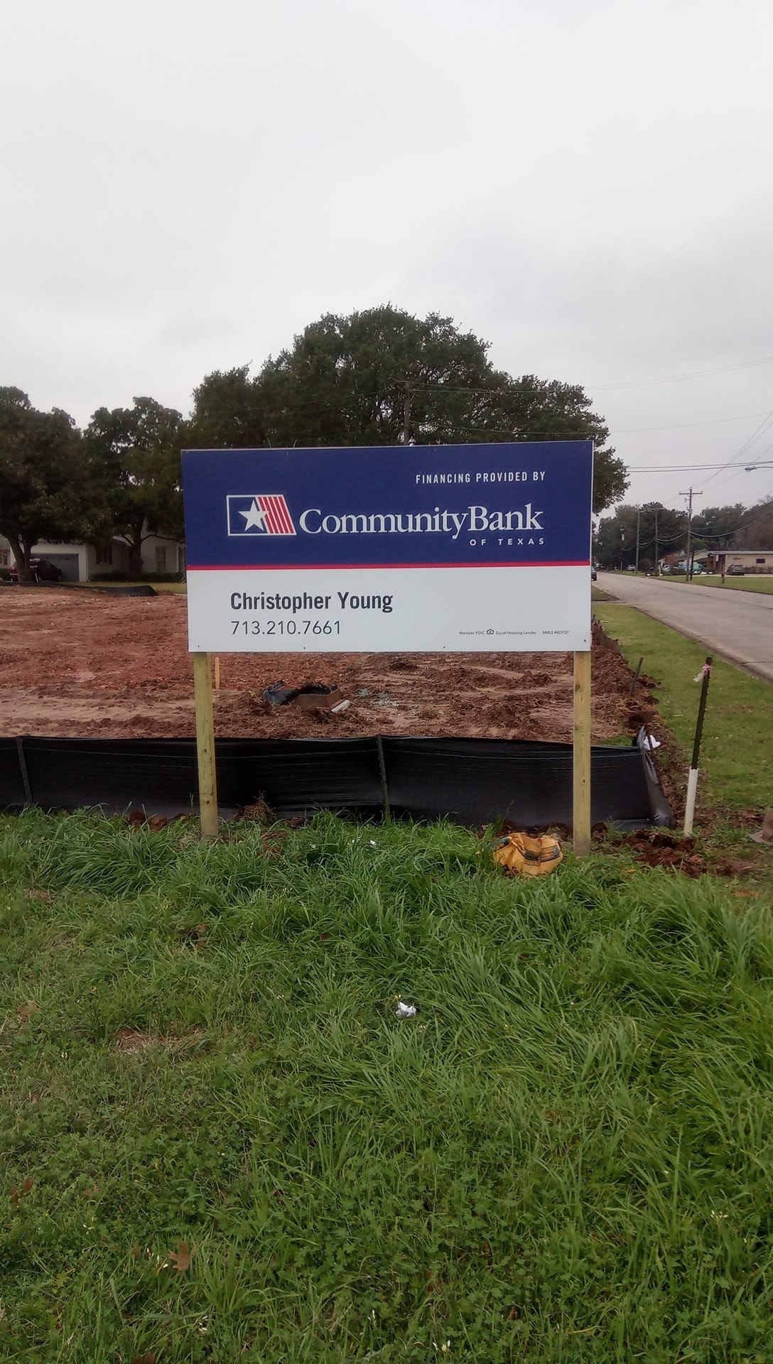 Lender and construction post signs on cleared land — Intrepid Signs, Rosenberg TX