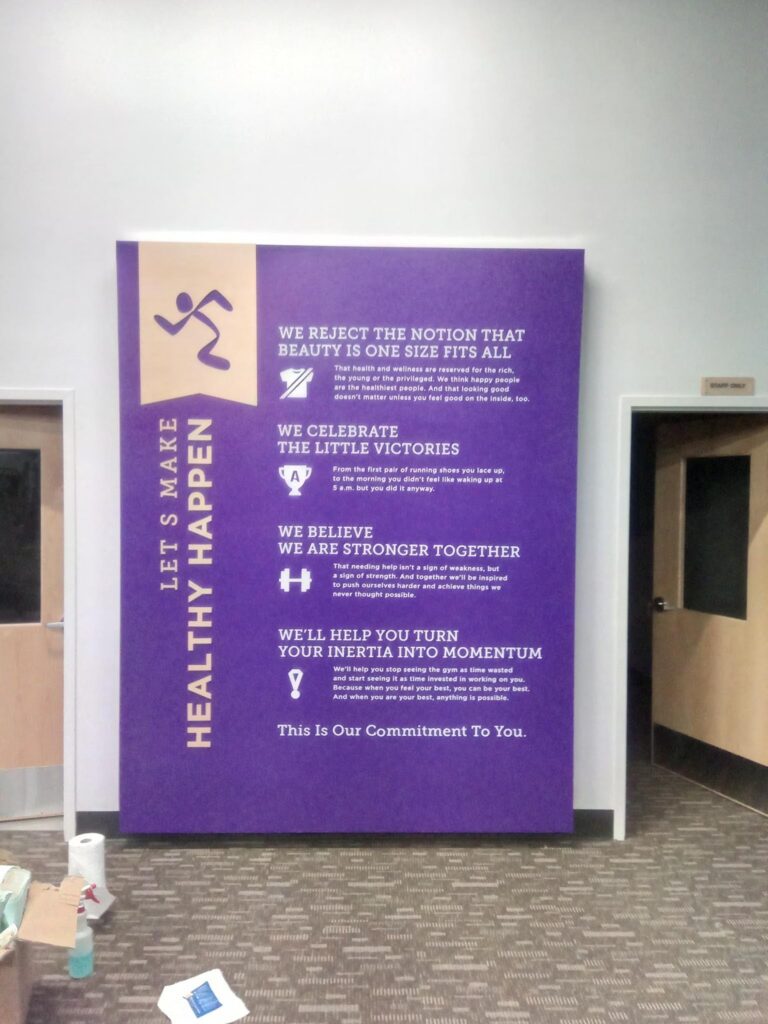 Custom interior lobby signage installed in Texas