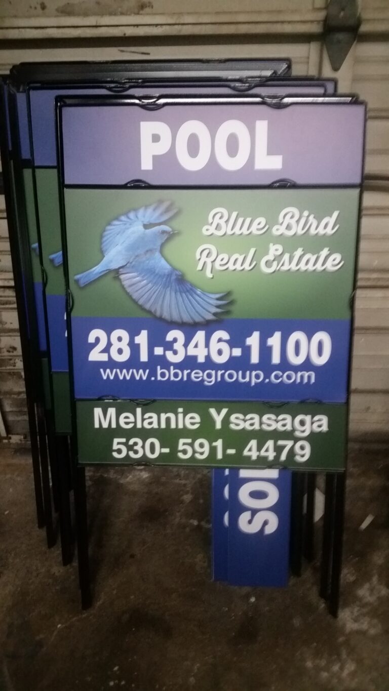 Blue Bird Real Estate post sign with a Pool rider