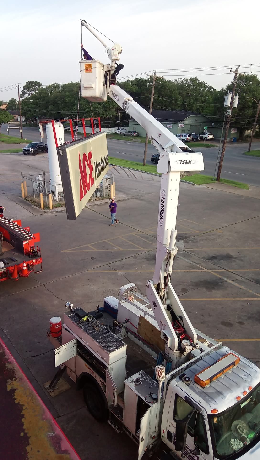 Boom lift working on a pole sign cabinet — Intrepid Signs, Rosenberg TX