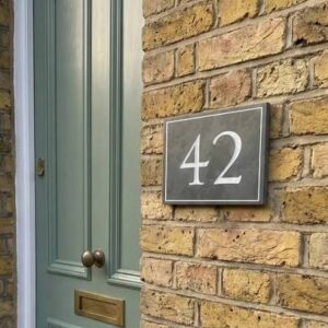 42 unit number plaque beside a door