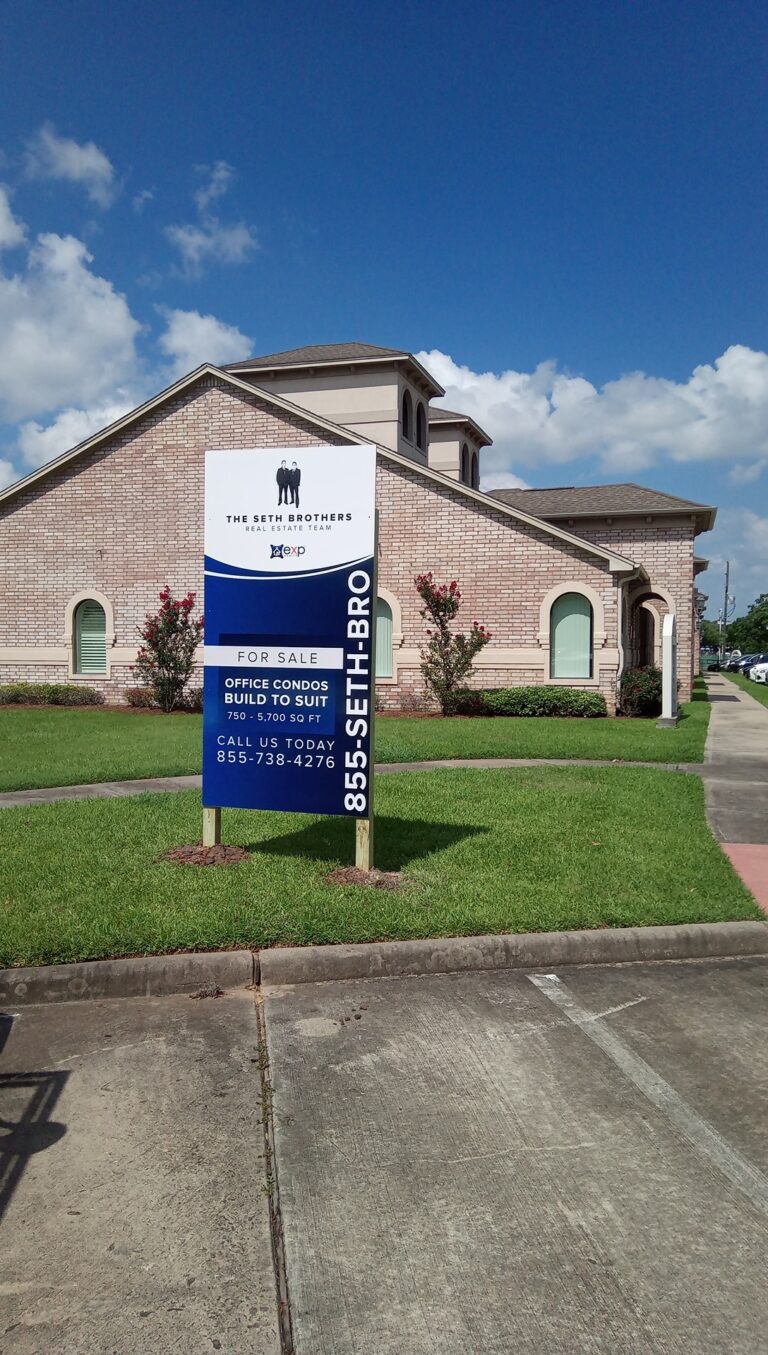 Blue realtor post sign outside a house — Intrepid Signs, Rosenberg TX