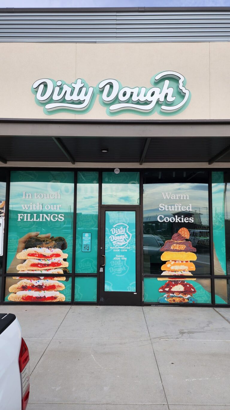 Storefront sign installed on a commercial building in Rosenberg, Texas